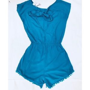 Mimi chicks romper with back cut out.